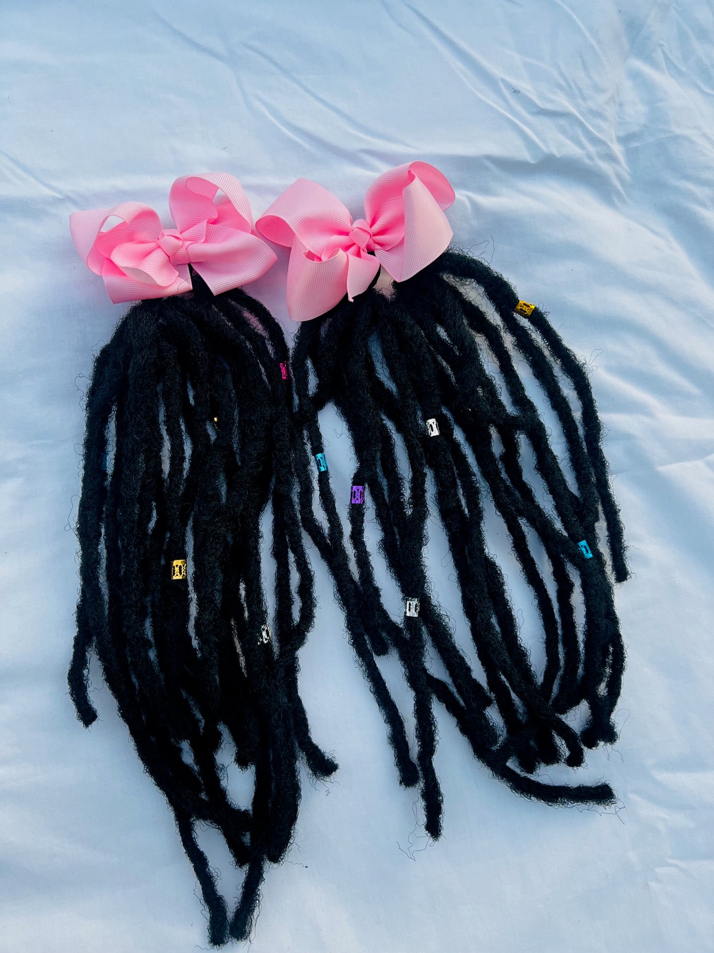 Dreadlock Extensions With Bow and Beads